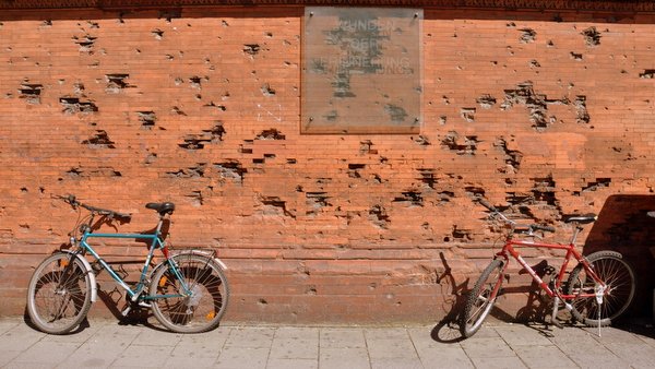 Damage from World War II bombing was intentionally left on an otherwise restored building here in Munich, a reminder of the war.